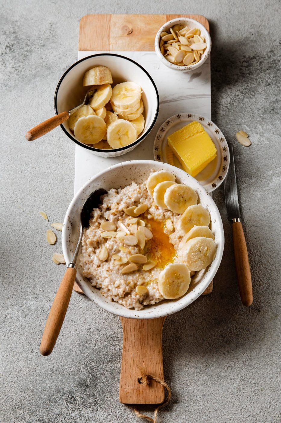 Oatmeal bowl with banana, honey & almonds